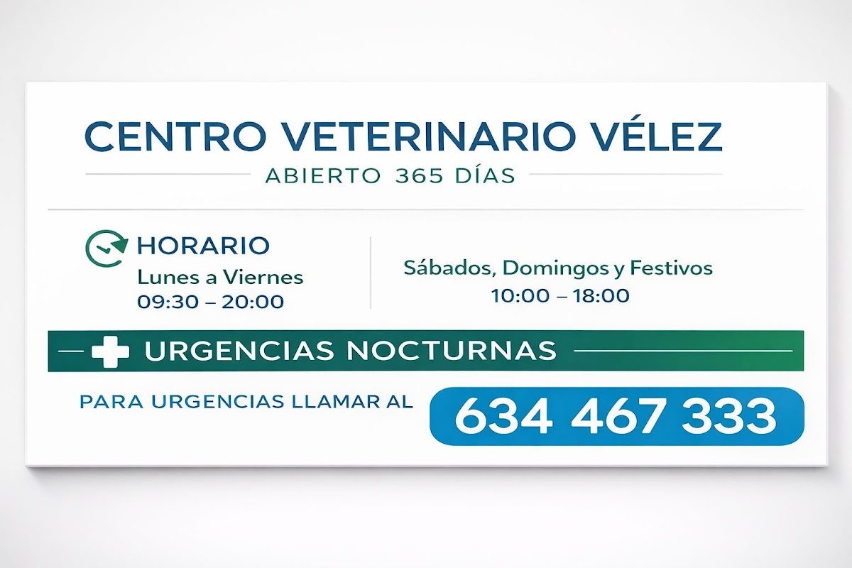 Signage for 365 Veterinarios displaying operating hours and emergency contact information.