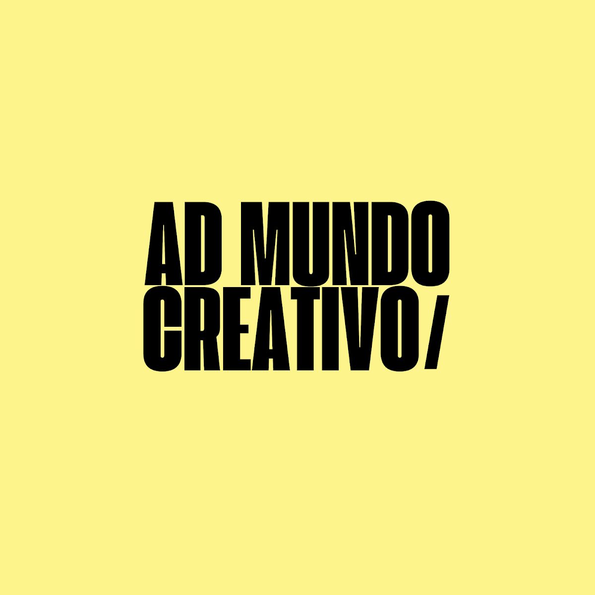 Texto negro en negrita sobre fondo amarillo brillante que dice "AD MUNDO CREATIVO".