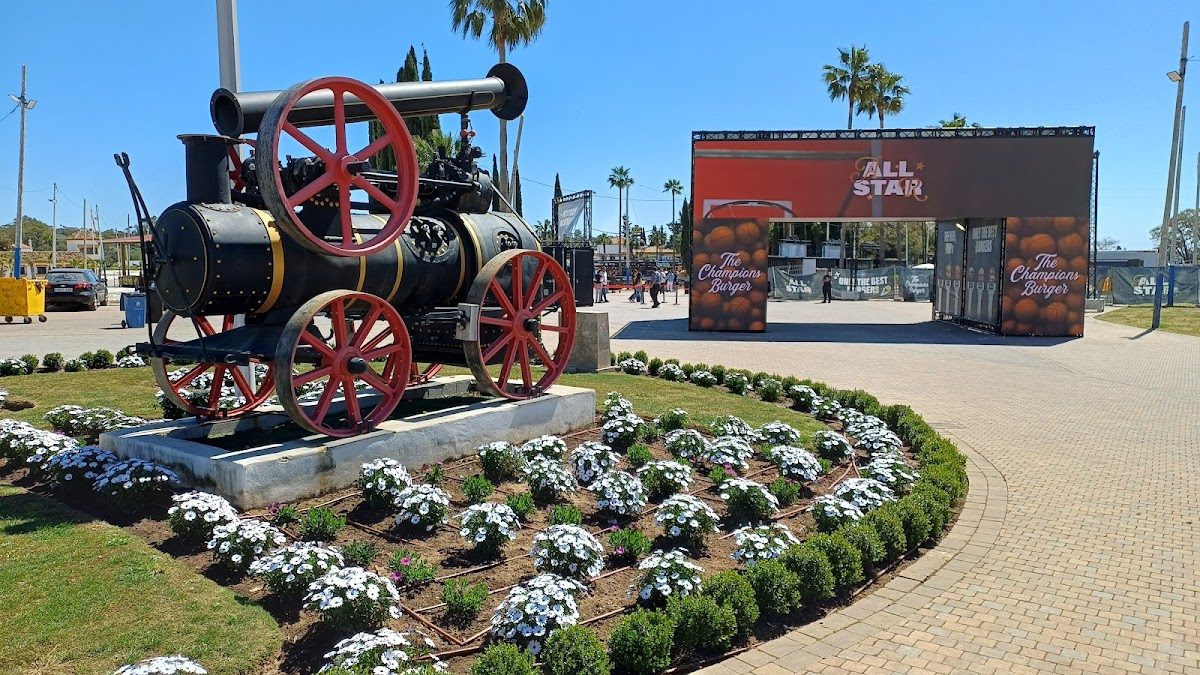 Finca La Caridad features an antique steam engine and landscaped gardens at its entrance.