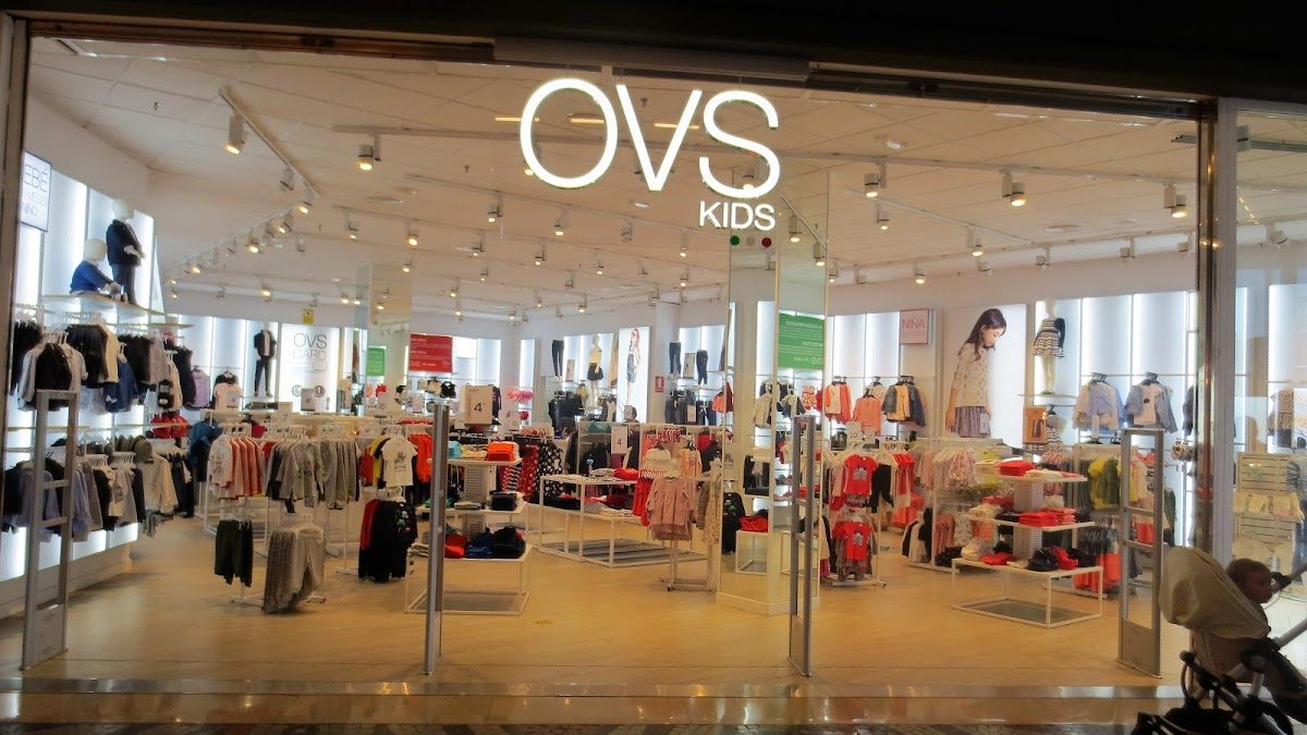 Brightly lit OVS Kids store showcasing a variety of children's clothing and accessories.